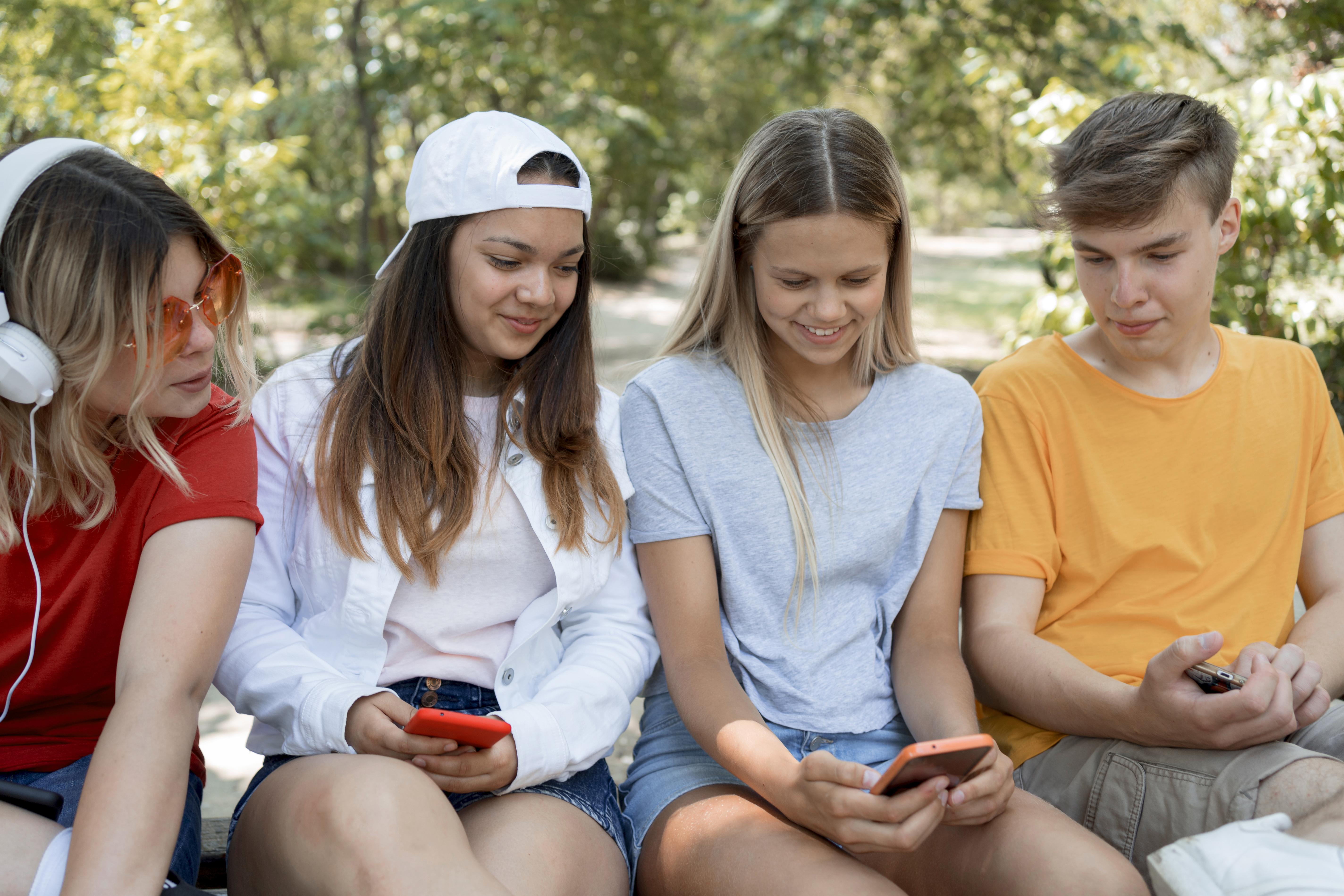 Teen using a phone